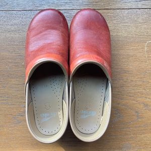 Dansko clogs in good condition.